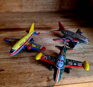 Vintagepickers Tin litho friction vintage planes.