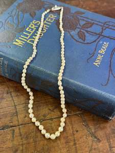 Pearls: Sea Water Pearls Graduated 22.5cm Length Cream in colour Knotted