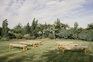 Bench Seats with Sheep Skin Covers - Wanaka Wedding Hire