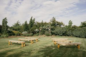 Products: Bench Seats with Sheep Skin Covers - Wanaka Wedding Hire