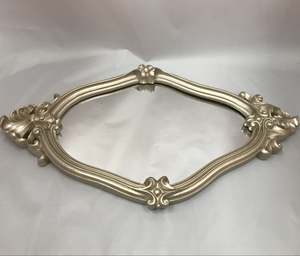 Golden framed mirror