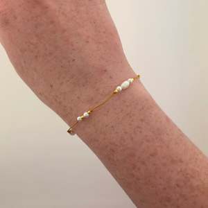 Fresh Water White Pearl Bracelet on thread with Gold plated Beads