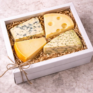 4 Cheeses in a cheese box. Let us know whether you would like a blue cheese or no blue .