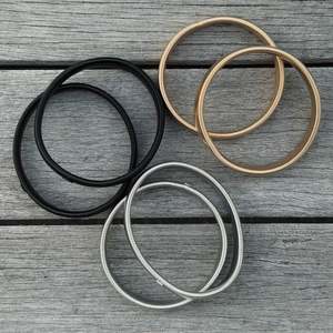 GOLDIE Sleeve Band
