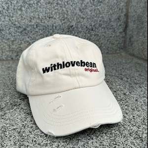 Products: Cream Distressed Cap