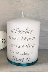A teacher takes a hand, opens a mind, and touches a heart