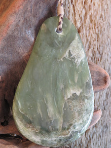 Products: Pale Pipiwharauroa Pebble-Form Pendant Woven Stone Jade
