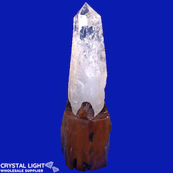 AAA Clear Quartz Point on Stand