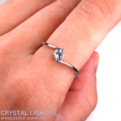 Sterling Silver Rings: Blue Topaz Bypass Ring