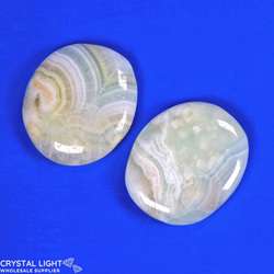 Flatstone Individuals and Lots: Pistachio Calcite Flatstone Lot