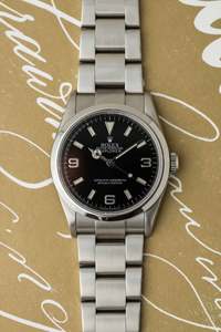 Available: Rolex Explorer I Ref. 114270 'Engraved Rehaut' 2009 w/ Box & Papers