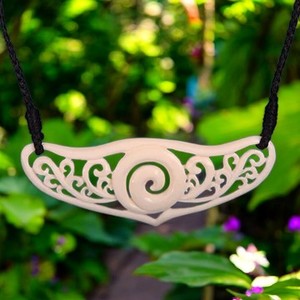 Bone Carvings: Intricate Koru Breastplate Pendant