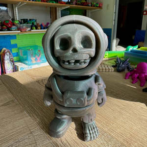 3D Printed Tiny Skeleton Astronaut upscaled 300% missing shoe