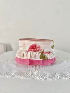 Bag 1: Pink frilled essential pouch