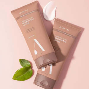Tanning: Nourish & Glow Gradual Tan Lotion – Medium/Dark
