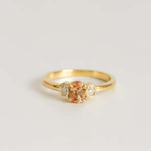 One Of A Kind: Orange Oval Sapphire with Diamonds in 18ct Yellow Gold