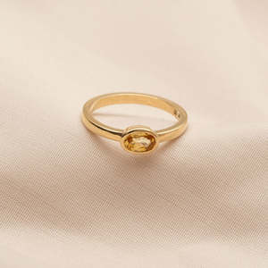 East-West 0.57ct Oval Yellow Sapphire
