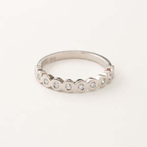 Orbit Half Eternity Ring